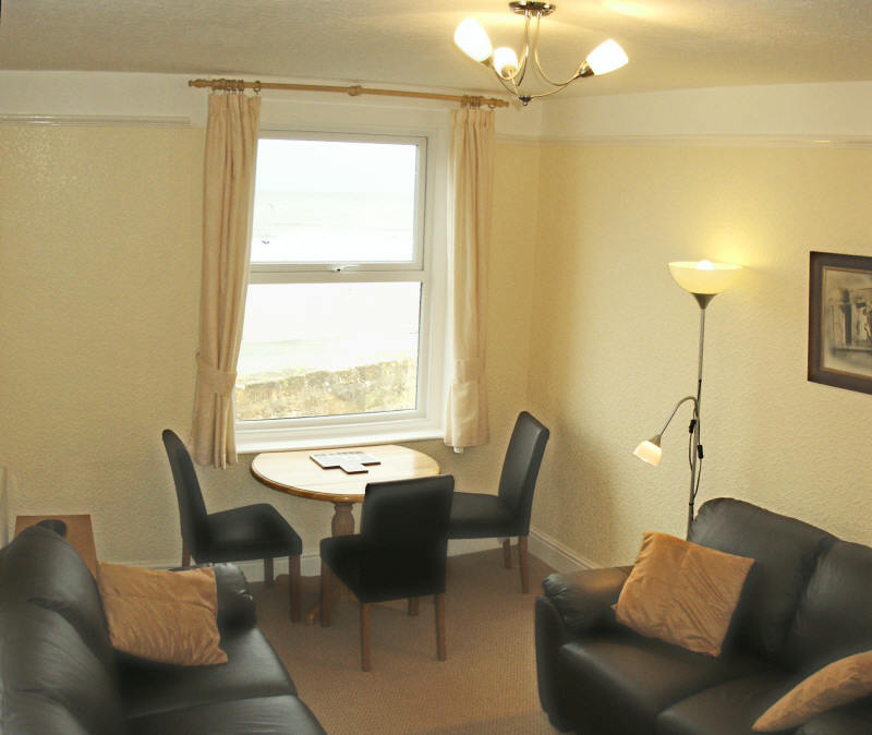 Filey seafront cottage living room window view